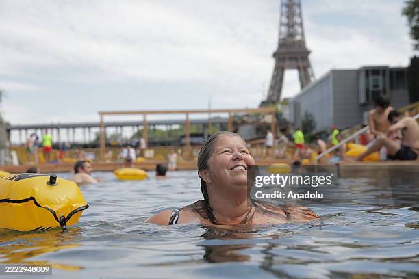 Parisians and visitors return to the Seine to swim officially for the first time after 100 years near the Eiffel Tower in Paris, France on July 5,...