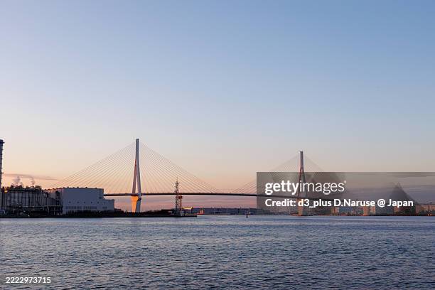 the first sunrise and tsurumi-tsubasa bridge. - tsubasa stock pictures, royalty-free photos & images