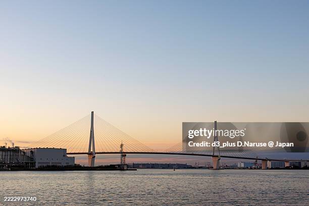 the first sunrise and tsurumi-tsubasa bridge. - tsubasa stock pictures, royalty-free photos & images