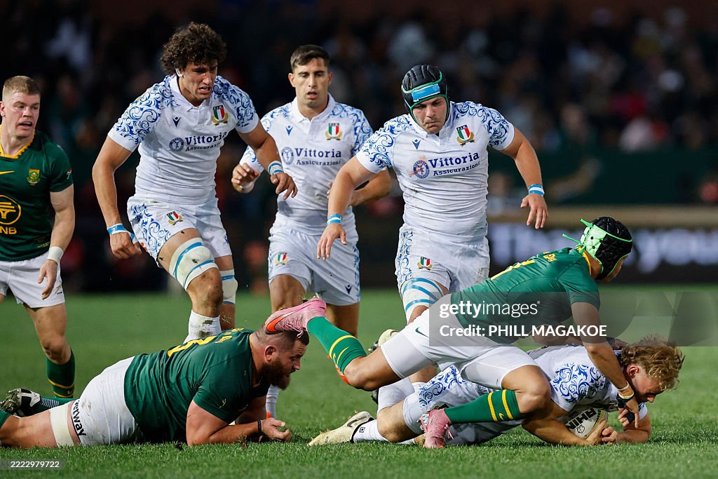 Wing In Rugby South Africa's wing Kurt-Lee Arendse tackles Italy's wing Louis... News ...