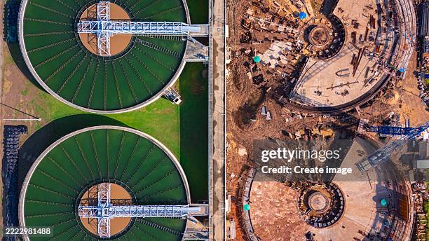 aerial view construction of water treatment plant for purify water or environment conservation. - garage storage clean stock pictures, royalty-free photos & images
