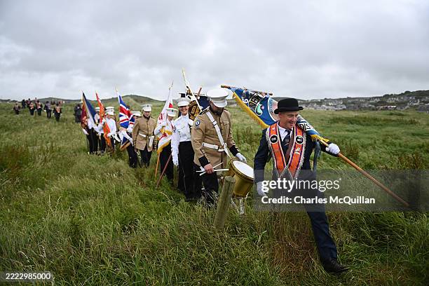 Orange order members make their way towards the beach at Rossnowlagh on July 5, 2025 in Donegal, Ireland. The demonstration in Rossnowlagh is...