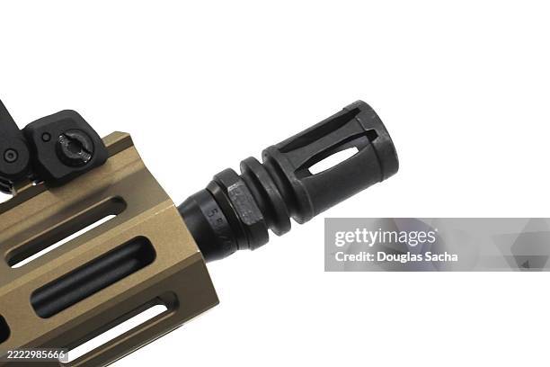 muzzle brake part on a assault rifle - carbine stock pictures, royalty-free photos & images
