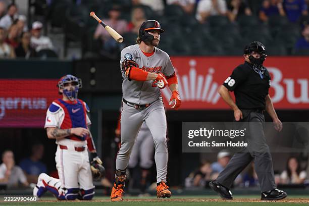 Gunnar Henderson of the Baltimore Orioles flips his bat after hitting a two-run home run during the 10th inning against the Texas Rangers at Globe...