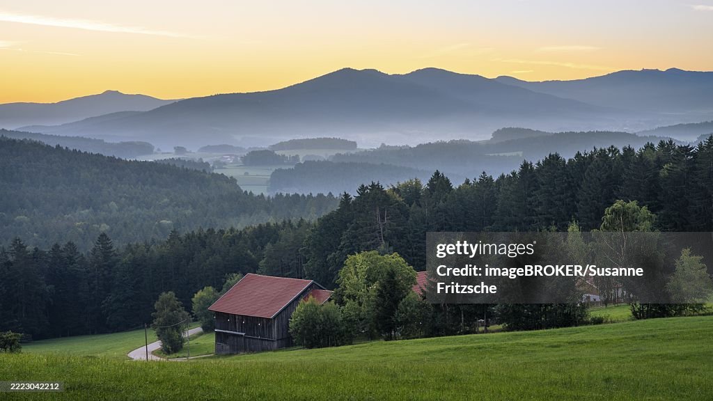 Landscape with forest, meadows and mountains around the town of Bad Kötzting, with the Kaitersberg in the centre. In the morning in front of sunrise. District of Cham, Upper Palatinate, Bavarian Forest, Bavaria, Germany, Europe