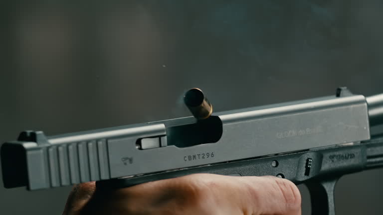 https://media.gettyimages.com/id/2223070122/video/military-gun-training-at-a-shooting-range-firing-bullets-in-super-slow-motion-close-up-hands.jpg?b=1&s=640x640&k=20&c=PAkythKx2bfmzZ4zZyZL6MN1chbNTdXM1X6fXH448Oo=