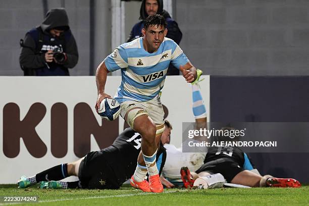 Argentina's flanker Pablo Matera runs to score a try during the international rugby test match between Argentina and England at the Jorge Luis...
