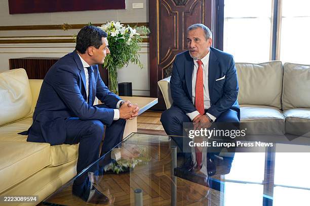 The president of the Junta de Andalucia, Juanma Moreno, with Peru's foreign minister, Elmer Schialer, during a meeting at the San Telmo Palace, July...