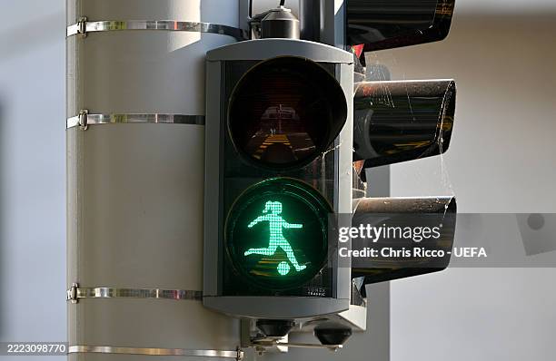 Detailed view of traffic lights which feature a female football player as the green light ahead of UEFA Women's EURO 2025 Group A match between...