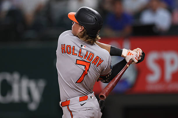 Jackson Holliday of the Baltimore Orioles swings his bat during the fourth inning against the Texas Rangers at Globe Life Field on June 30, 2025 in...