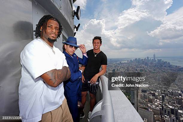 Ihmir Smith-Marsette, Sean Stellato, and Tommy DeVito visit the Empire State Building on July 01, 2025 in New York City.