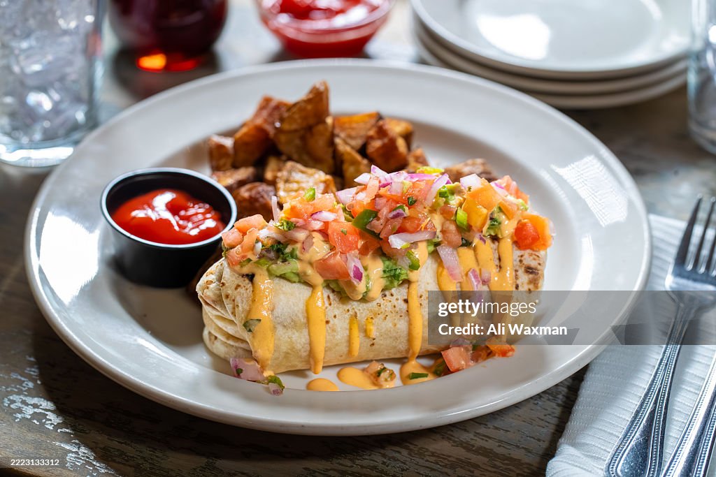 Breakfast burrito with home fries