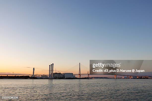the first sunrise and tsurumi-tsubasa bridge. - tsubasa stock pictures, royalty-free photos & images
