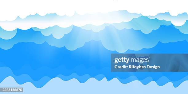 blue sky with blue and white cloudscape background - sun over ocean stock illustrations