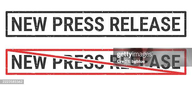 new press release - rubber stamps with crossed out stamp on white background - media release stock illustrations