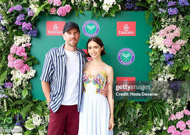 Charlie McDowell and Lily Collins attend as a guest of Emirates, Official Airline Partner of The Championships, Wimbledon on July 6, 2025 in...