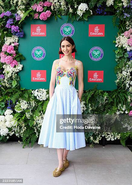 Lily Collins attends as a guest of Emirates, Official Airline Partner of The Championships, Wimbledon on July 6, 2025 in Wimbledon, England.