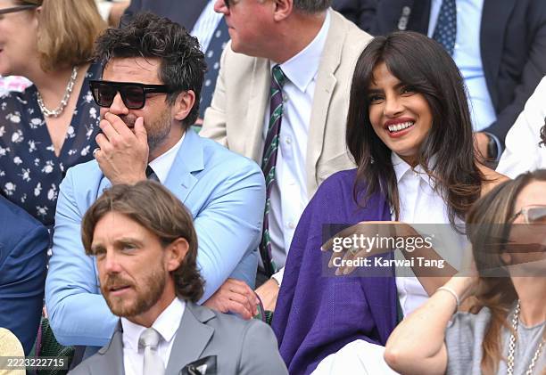 Dominic Cooper and Priyanka Chopra Jonas attend day three of the Wimbledon Tennis Championships at the All England Lawn Tennis and Croquet Club on...