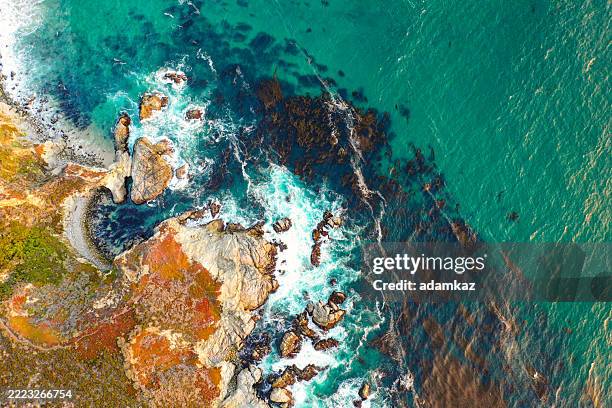 aerial drone image of sunset at pacific ocean at big sur - monterrey aerial stock pictures, royalty-free photos & images