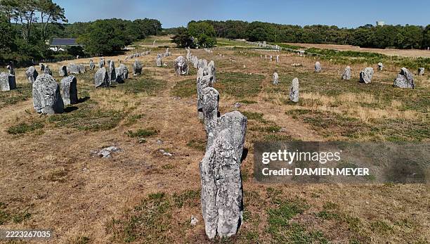 This aerial photograph shows the Megaliths of the "Carnac Alignments" in Carnac, western France, on July 4, 2025. The megaliths of Carnac and the...