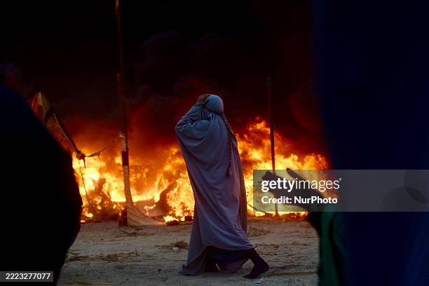 Iraqis take part in a reenactment commemorating the events of the Battle of Karbala during the Islamic month of Muharram, in Nasiriyah, Dhi Qar...