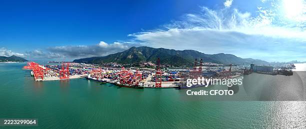 Cargo ship is berthed at the container terminal of Lianyungang Port to load and unload containers in Lianyungang, Jiangsu Province, China on July 7,...