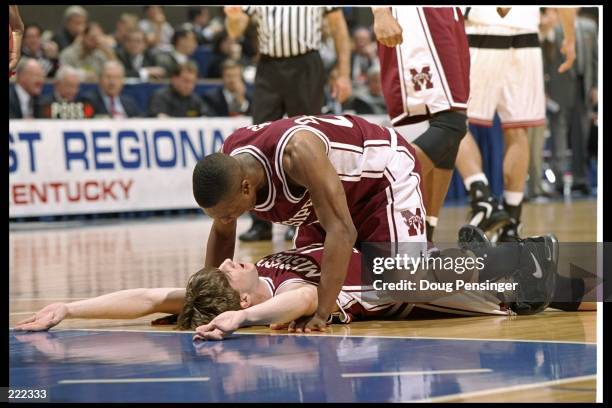 Mississippi State Bulldogs forward Whit Hughes and guard Darryl Wilson celebrate during a game against the Cincinnati Bearcats at Rupp Arena in...