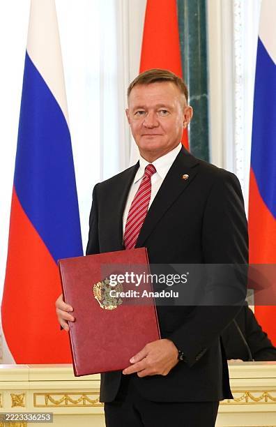 File photo dated June 17, 2025 shows Russian Transport Minister Roman Starovoyt poses for a photo with an agreement signing file in St. Petersburg,...