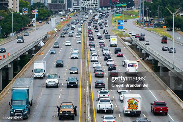 In an aerial view, traffic is seen on Interstate 35 on July 03, 2025 in Austin, Texas. AAA Travel is forecasting a record high of approximately 72.2...