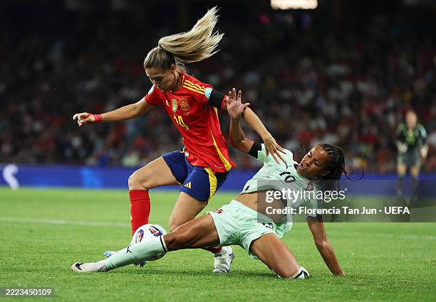 Laia Aleixandri of Spain is challenged by Jessica Silva of Portugal during the UEFA Women's EURO 2025 Group B match between Spain and Portugal at...