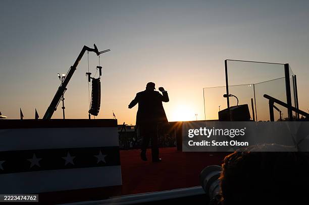President Donald Trump leaves after speaking at a rally to kick off the July Fourth holiday weekend at the Iowa State Fairgrounds on July 03, 2025 in...