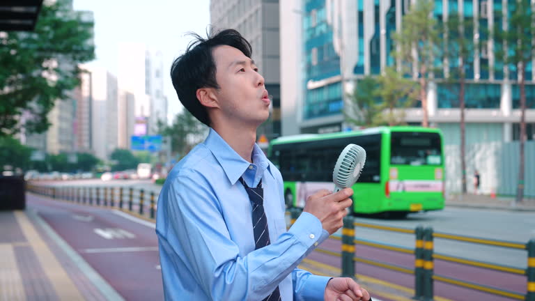 People Using Handheld Fan 128 Handheld Fan Stock Videos, Footage, & 4K Video Clips - Getty Images