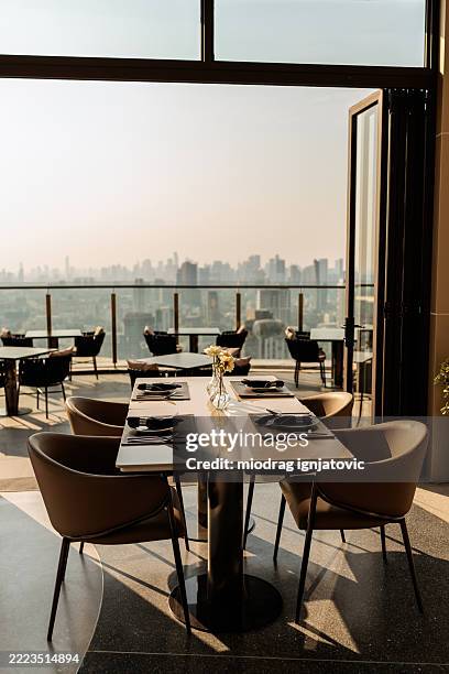 rooftop bar terrace with bangkok city view - gymnastics bar stock pictures, royalty-free photos & images