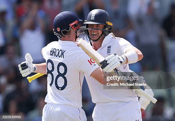 Harry Brook congratulates Jamie Smith of England upon reaching his century during the day three of the 2nd Rothesay Test Match at Edgbaston on July...