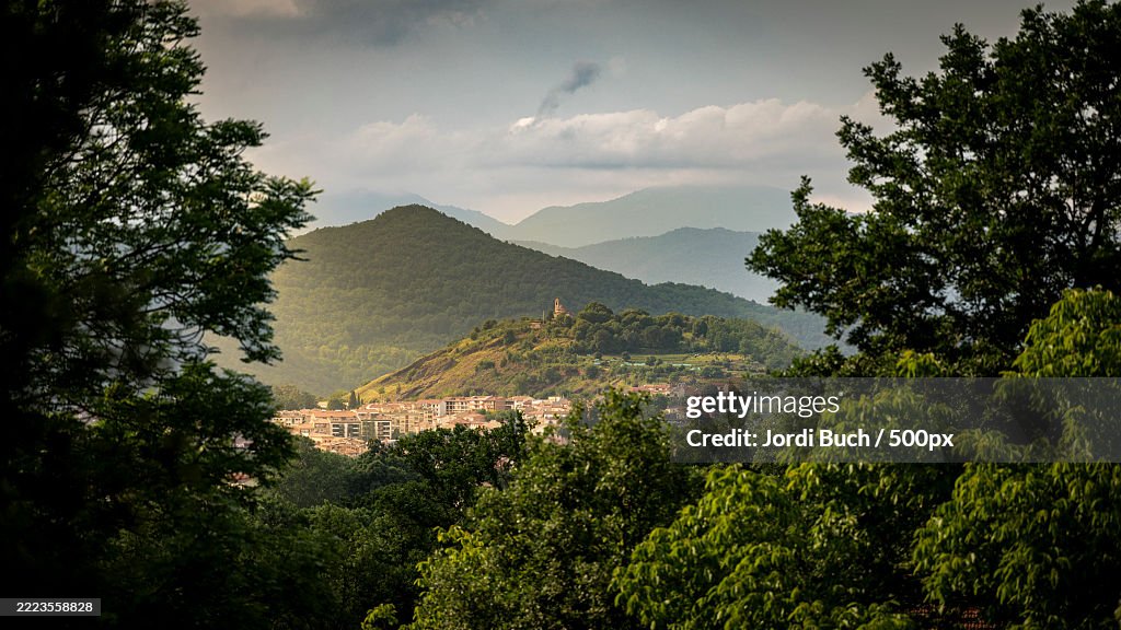 Scenic view of mountains against sky,Olot,Spain