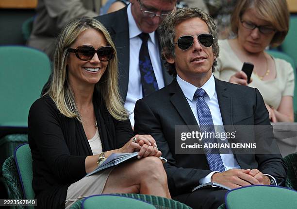 Actor Ben Stiller and wife Christine watch Switzerland's Roger Federer play against Czech Republic's Tomas Berdych during a Men's Quarter Finals...