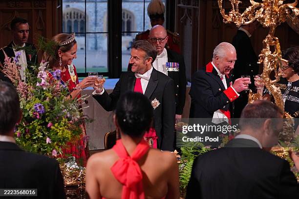 Catherine, Princess of Wales looks on as King Charles III and French President Emmanuel Macron toast at a state banquet on July 8, 2025 in Windsor,...