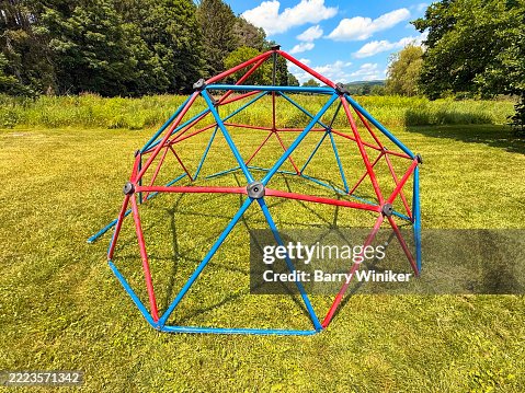 Geodesic dome playground equipment atop lawn in rural setting, Craryville Geodesic dome playground equipment atop lawn in rural setting, Craryville