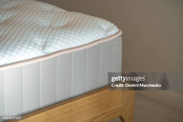 orthopedic mattress of medium firmness for spine support. medium density foam, posture improvement - látex fotografías e imágenes de stock