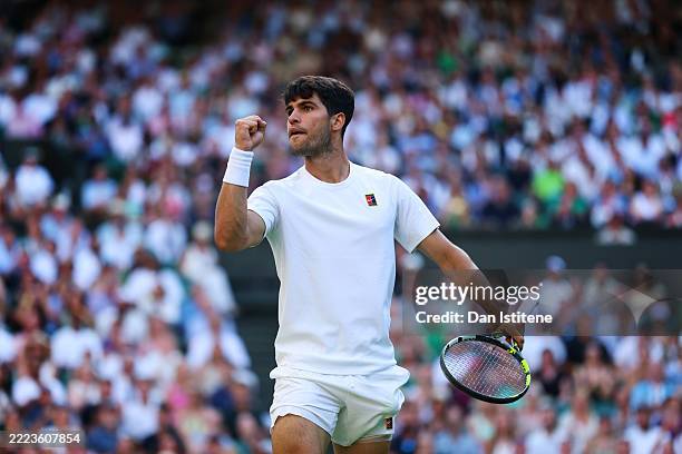 Carlos Alcaraz of Spain celebrates against Jan-Lennard Struff of Germany during the Gentlemen's Singles third round match on day five of The...