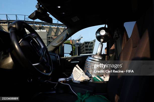 Libertadores trophy replica sits in a Palmeiras fan car outside the stadium prior to the FIFA Club World Cup 2025 quarter final match between SE...