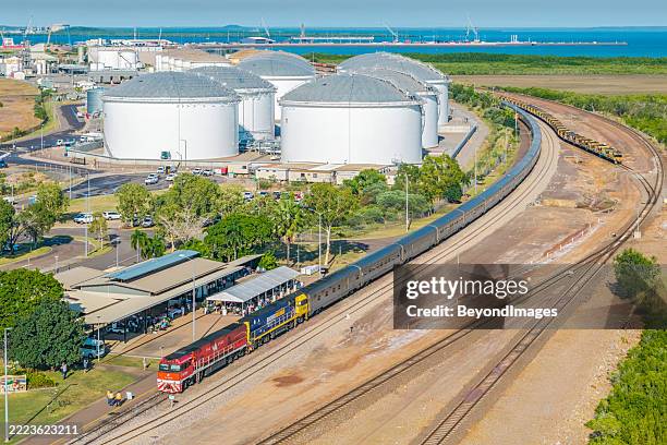 aerial view of the ghan luxury train waiting to depart darwin - fuel storage tank stock pictures, royalty-free photos & images