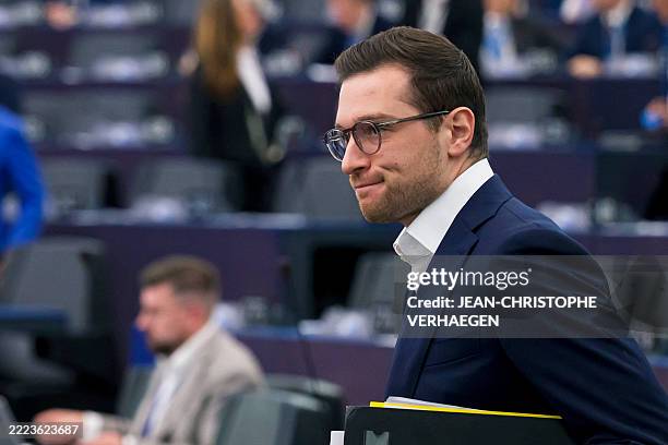 French far-right party Rassemblement National President and MEP Jordan Bardella stands as he attends a voting session, as part of a plenary session...