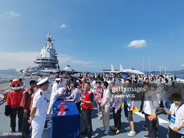 People visit aircraft carrier Shandong on July 5, 2025 in Hong Kong, China. The aircraft carrier Shandong formation of the Chinese People's...