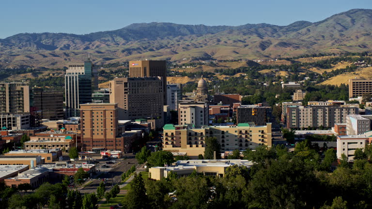 https://media.gettyimages.com/id/2223657637/video/panoramic-sweep-of-boise-downtown-skyline-modern-buildings-nestled-against-idaho-foothills.jpg?b=1&s=640x640&k=20&c=lR5bhykezWR_CinC6kQRgrLlClp4GCO9IoZpYW4mvk8=