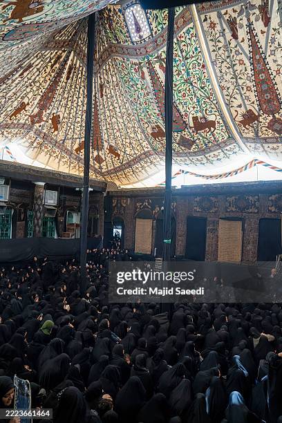 Iranian Shiite women mourn during a Tasua ceremony on July 5, 2025 in Tehran, Iran. Muharram is one of the four holy months of Islam.