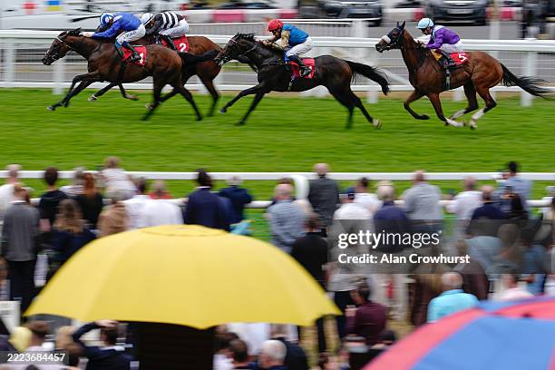 Jim Crowley riding Mudbir win The Coral Celebrating 50 Year Eclipse Sponsorship Handicap at Sandown Park Racecourse on July 05, 2025 in Esher,...