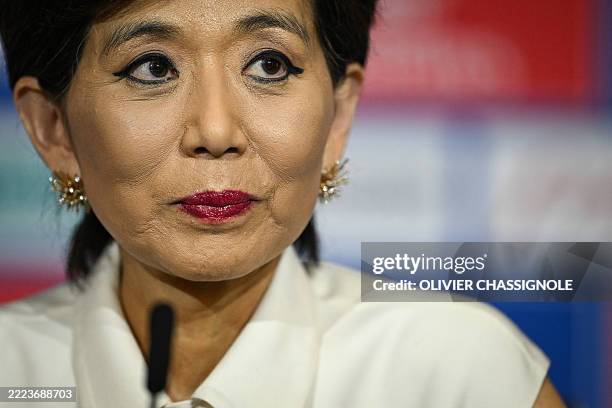 Businesswoman and President of Olympique Lyonnais and OL Lyonnes, Michele Kang, looks on during a press conference at the Groupama Stadium in...