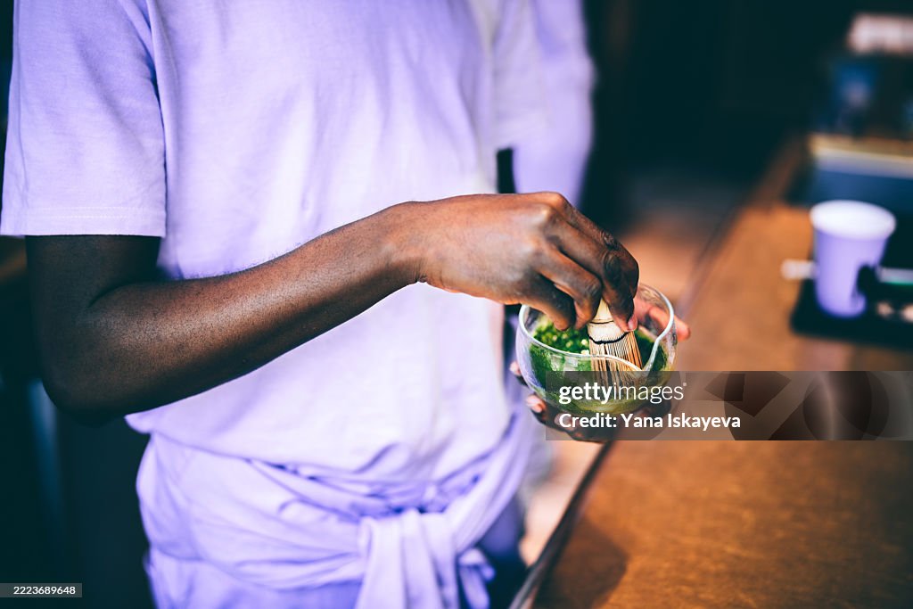 Preparing matcha tea in a mindful ritual