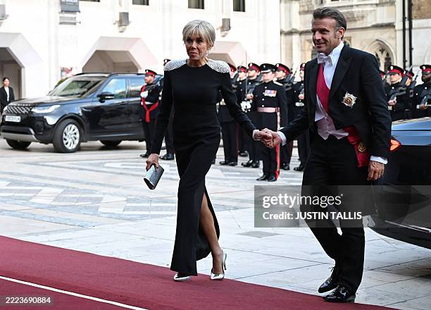 France's President Emmanuel Macron and his wife Brigitte Macron arrive to attend a State Banquet at the Guildhall in London, on July 9 on the second...